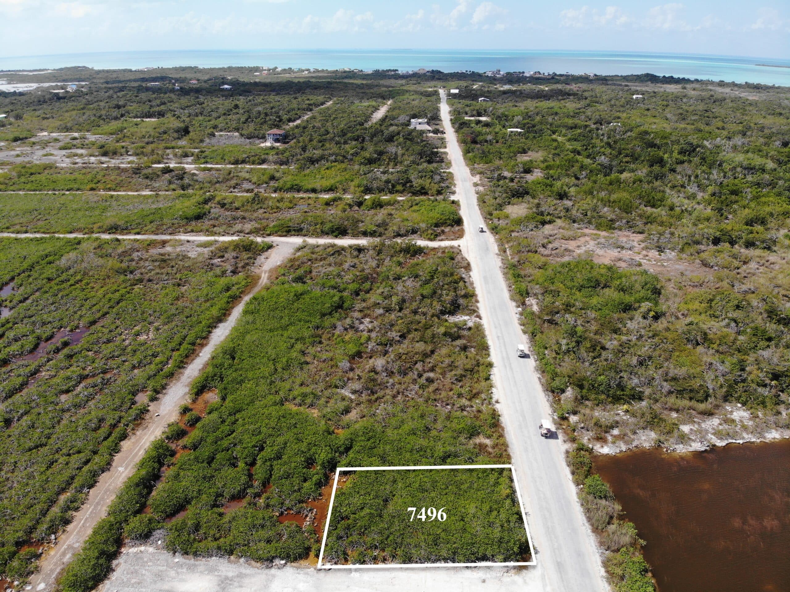 Owner financing road side lot to Secret Beach 3
